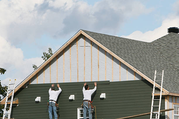 Professional Emergency Siding Repair technician working in Nicktown, PA